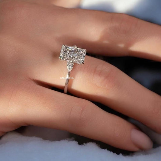 3 ct radiant cut moissanite three stone pear Diamond