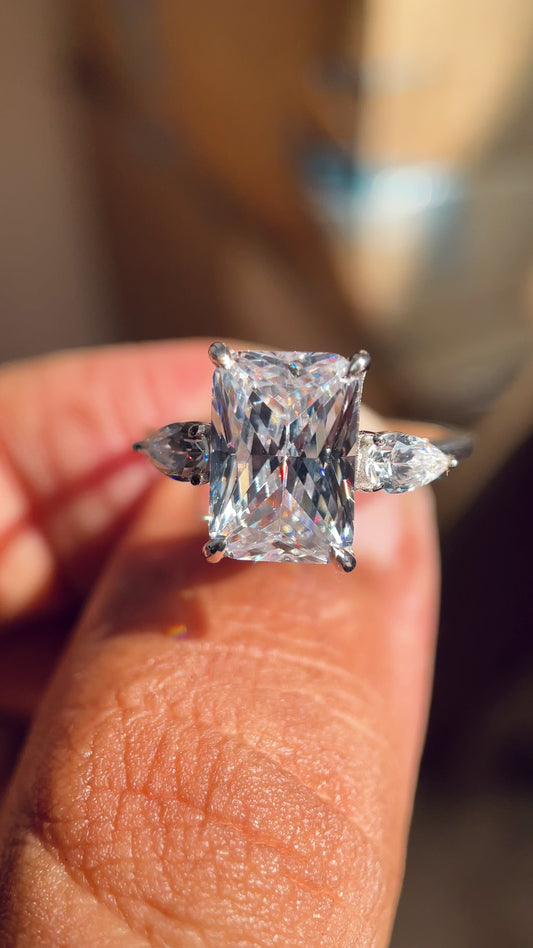 3 ct radiant cut moissanite three stone pear Diamond